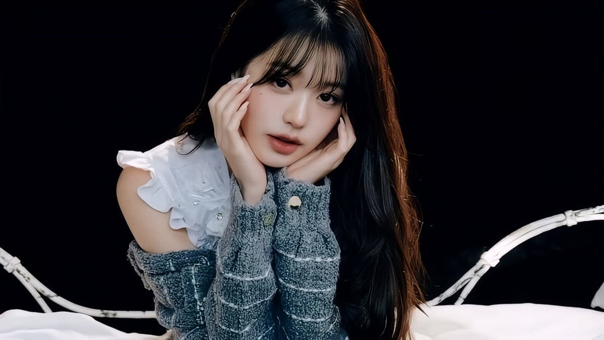 An IVE member in a concept photo, representing the group's signature premium elegance aesthetic