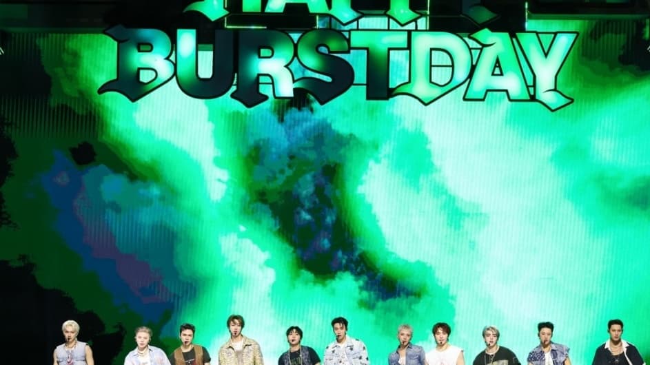 All 13 SEVENTEEN members on stage during their 10th anniversary concert event in May 2025